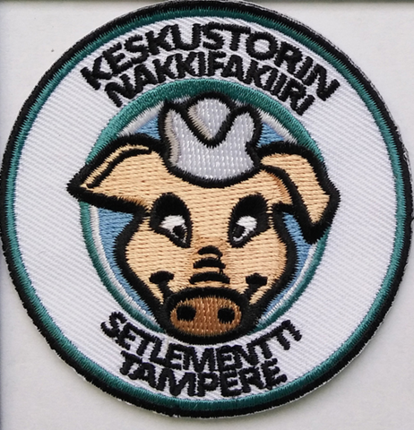 Keskustorin Nakkifakiiri - kangasmerkki