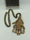 Kalevala koru Uhtuan sotka halsband/brosch