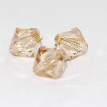 Swarovski bicone 6mm kullankeltainen