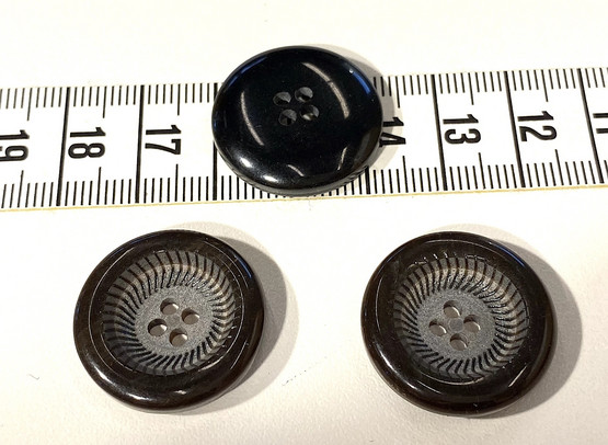 Nappi musta/harmaa 23mm