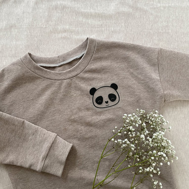 Silityskuva: Silmälasi-panda