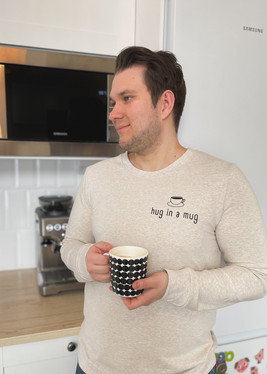 Silityskuva teksti: Hug in a mug