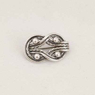 Kalevala Koru, Teljänneito -Solki, Hopeaa