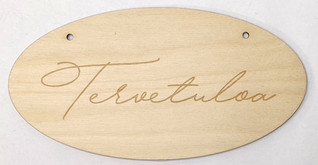 Tervetuloa-ovikyltti