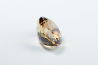 Imperial topaz ovaali 12ct Brasiliasta kullan ruskeilla loisteilla