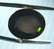 Kromi Diopsidi 8,5ct / 16,2mm , mustan näköinen vihreillä loisteilla
