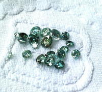 Moissaniitti / moissanite 0,8ct / 6,2mm  harvinaisempi sinertävän  vihreä sävy
