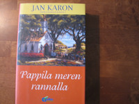 Pappila meren rannalla, Jan Karon