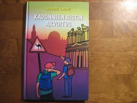 Kadonneen ristin arvoitus, Mauri Laine