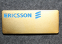 Ericsson name tag. Blue text