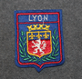 Lyon, matkamuisto kangasmerkki. Huopapohja.