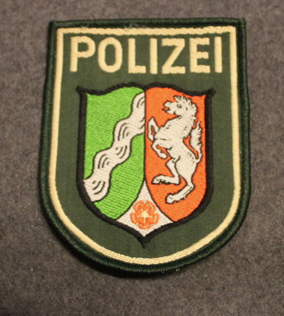 Polizei, Nordrhein-Westfalen. Saksan poliisi, käsivarsimerkki. 