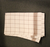 Kitchen towel, issued, red / brown chequered.