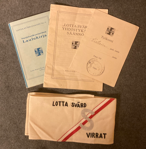 Lotta Svärd armband, books and work card.