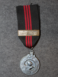 Commemorative medal of Winter war + Air Defense bar